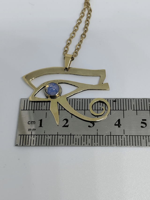 Pendentif symbole égyptien oeil d'Horus doré avec Opalite LEIA&CO