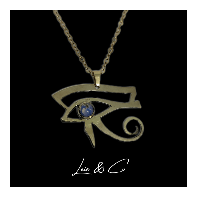 Pendentif symbole égyptien oeil d'Horus doré avec Opalite LEIA&CO